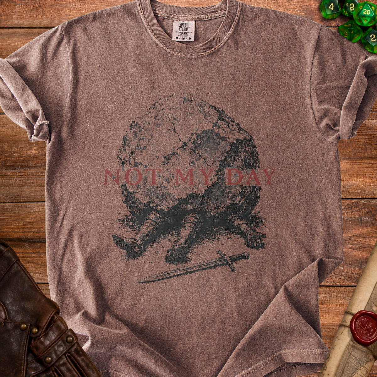 Brown t-shirt with "Not My Day" text and a graphic of a knight trapped under a rock.