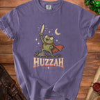 Purple t-shirt with a cartoon frog warrior holding a sword, text "HUZZAH".