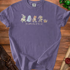 Purple t-shirt with a graphic of "the fellowship of the nap" characters.