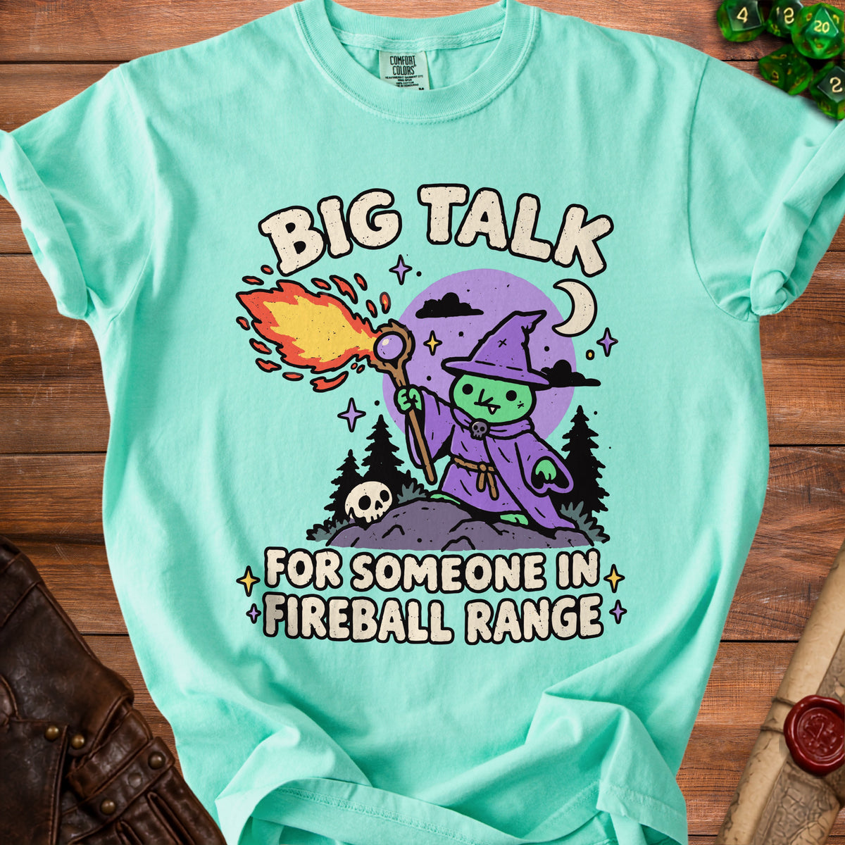 Teal t-shirt with cartoon wizard and text "BIG TALK FOR SOMEONE IN FIREBALL RANGE".