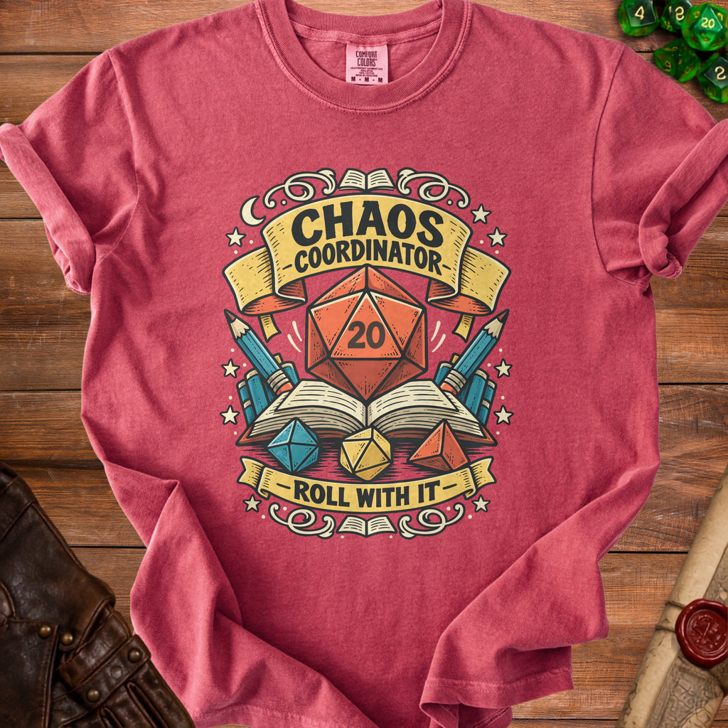 Red t-shirt with "Chaos Coordinator - Roll With It" and D20 dice graphic.