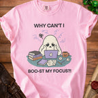 Pink t-shirt with a cartoon ghost looking stressed at a laptop, reading "Why Can't I Boo-st My Focus?!".