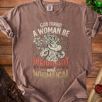 Brown t-shirt with "God forbid a woman be weird hot and whimsical" text and illustration.