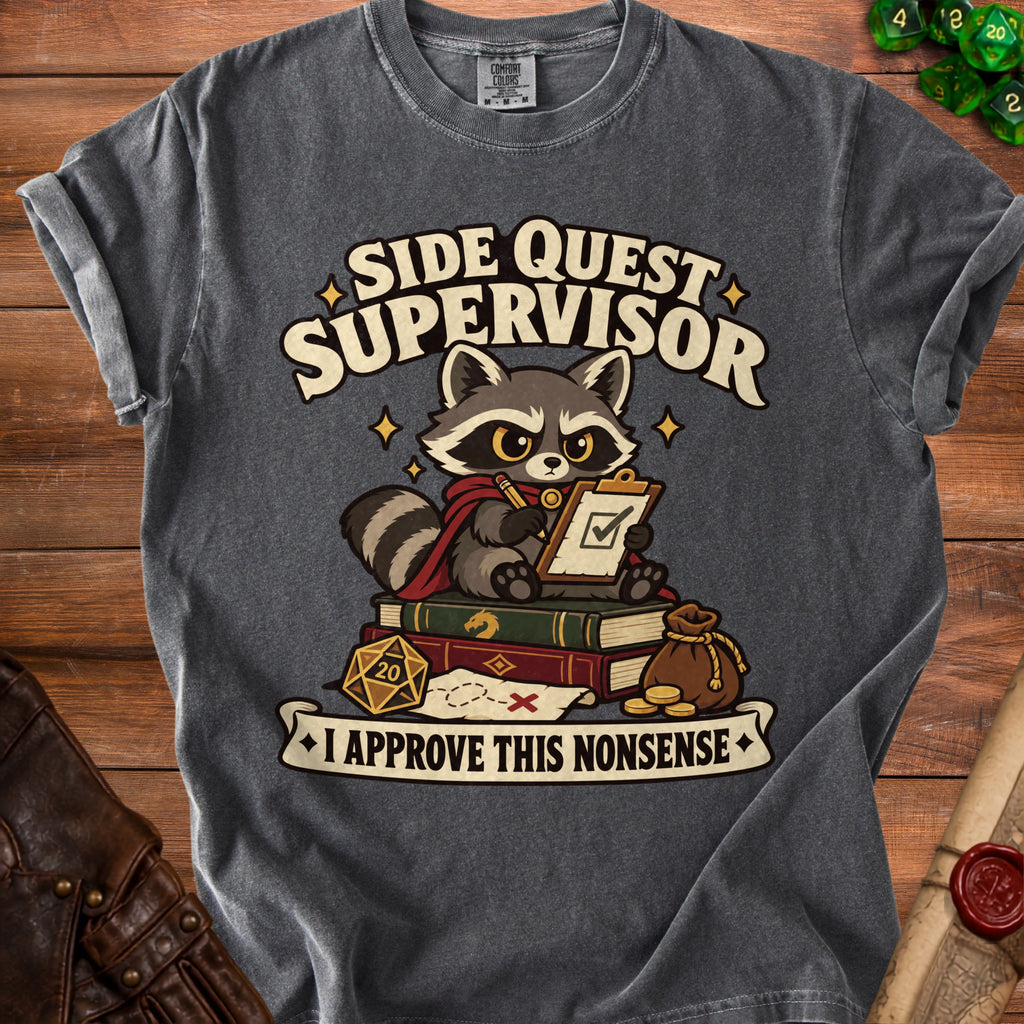 Charcoal t-shirt featuring a graphic of a raccoon holding a clipboard with text reading "Side Quest Supervisor" and "I Approve This Nonsense."