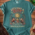 Teal t-shirt with "Let's Start A Cult Recruiting Bad Influences Since 1692" text and witches graphic.