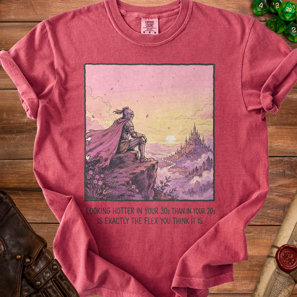 T-shirt with knight overlooking castle and text "Looking hotter in your 30s than in your 20s is exactly the flex you think it is."