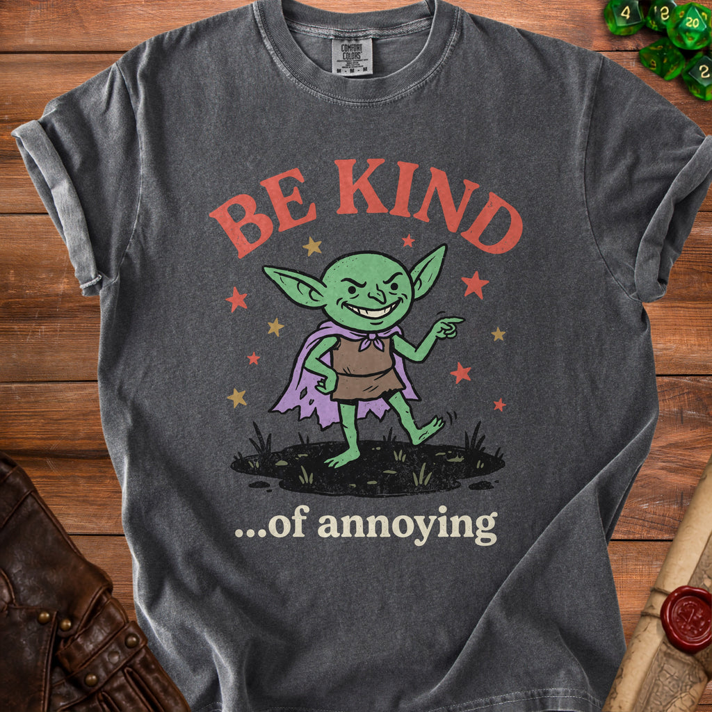 Dark gray t-shirt with graphic of green creature saying "Be Kind...of Annoying".