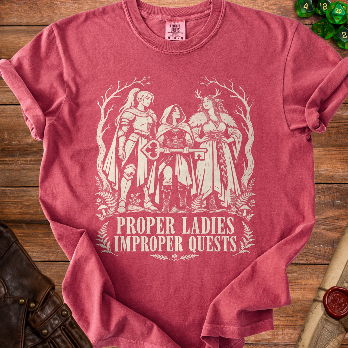 T-shirt with three fantasy women and the text "PROPER LADIES IMPROPER QUESTS".