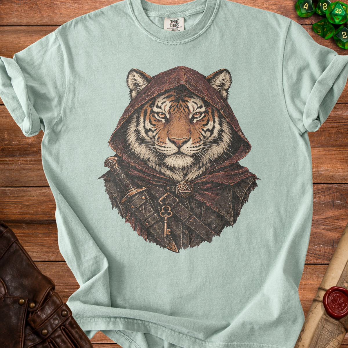 Light blue t-shirt featuring a detailed illustration of a tiger wearing a medieval hooded cloak and armor.
