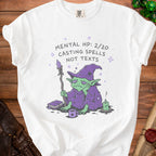 White t-shirt with a bored goblin casting spells, saying "Mental HP: 2/20 Casting Spells Not Texts".