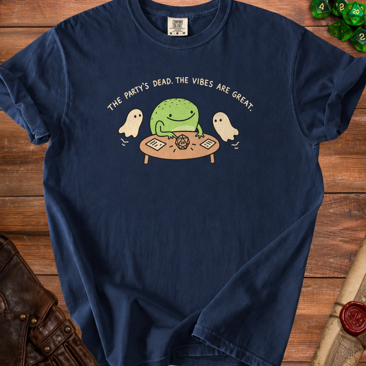 Navy t-shirt with frog, ghosts, and dice playing D&D.