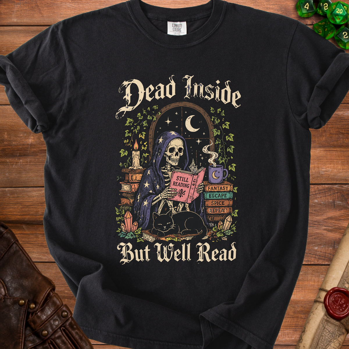 Skeleton reading "Still Reading" book with cat, "Dead Inside But Well Read" text.