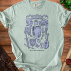 Light blue t-shirt with "Inventory full" and fantasy adventure items illustration.