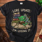 Goblin surrounded by books and scrolls, text reads "Lore Update: I'm Losing It".