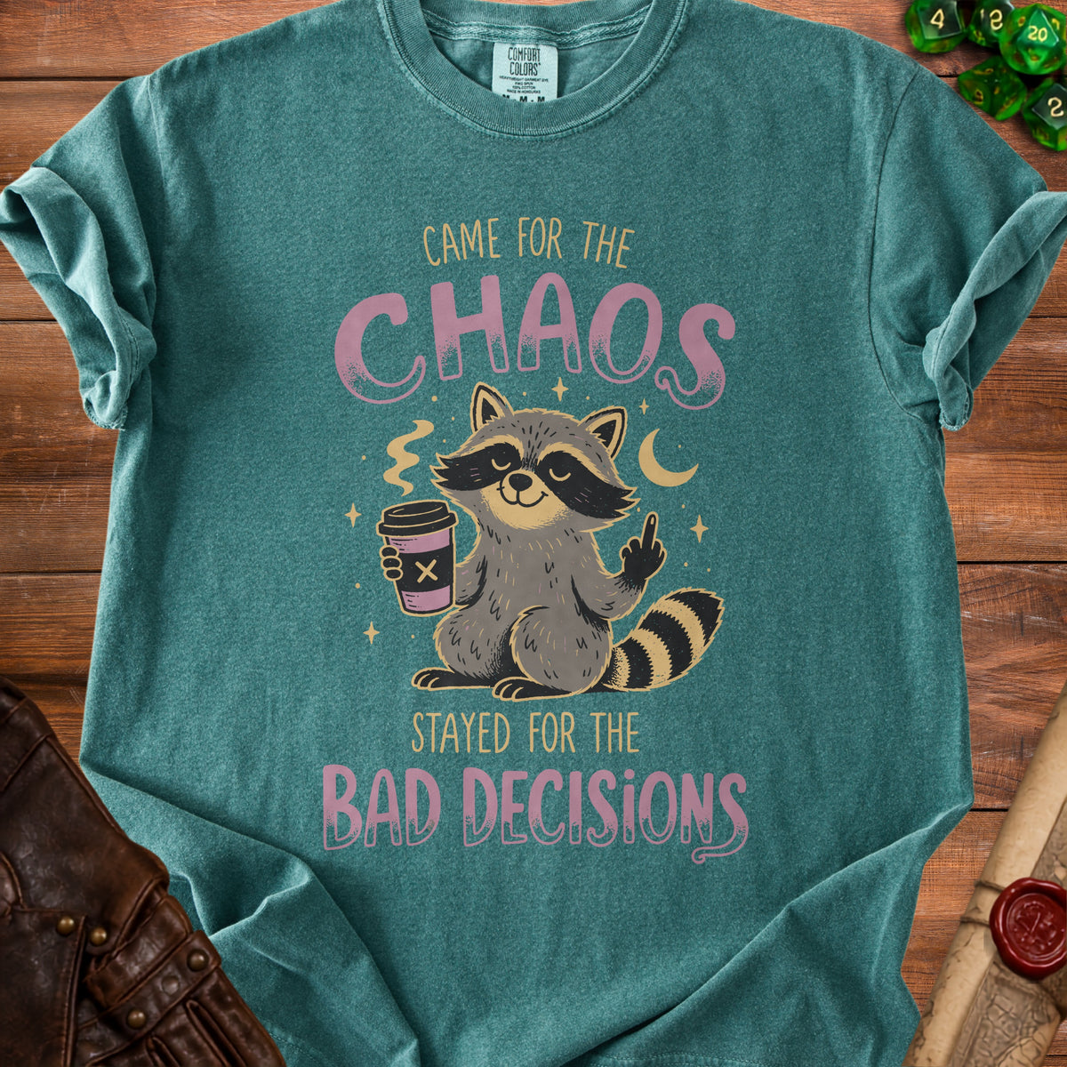Green t-shirt with raccoon saying "Came for the Chaos, Stayed for the Bad Decisions".