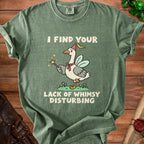 Green t-shirt with cartoon goose wearing a party hat and holding a wand, text reads "I FIND YOUR LACK OF WHIMSY DISTURBING".