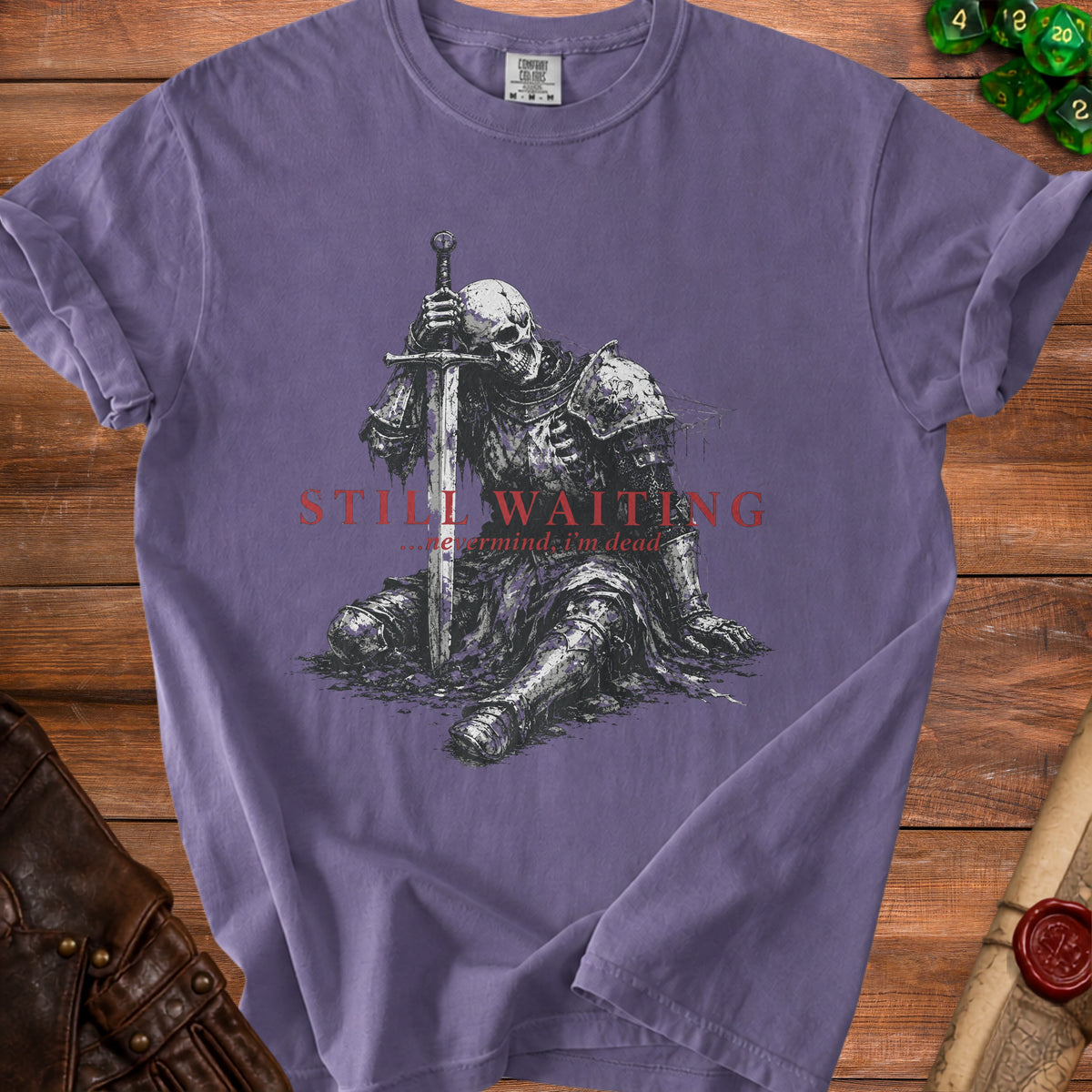 Purple t-shirt with skeleton knight graphic and text "STILL WAITING... nevermind, I'm dead".