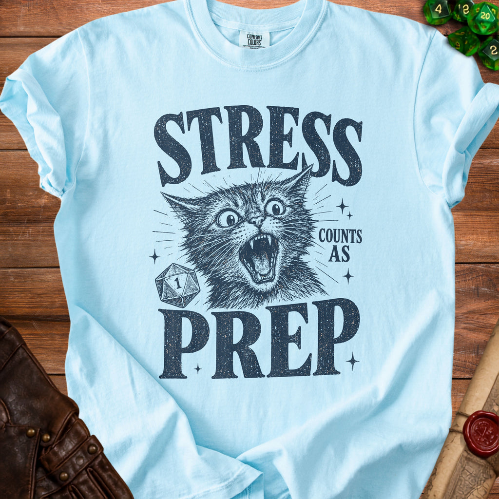 Light blue t-shirt with distressed print of a cat and text "STRESS COUNTS AS PREP".