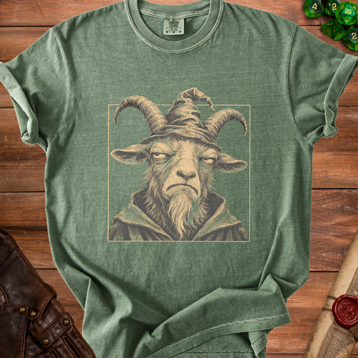 T-shirt with a dark green vintage wash featuring a wizard goat illustration.