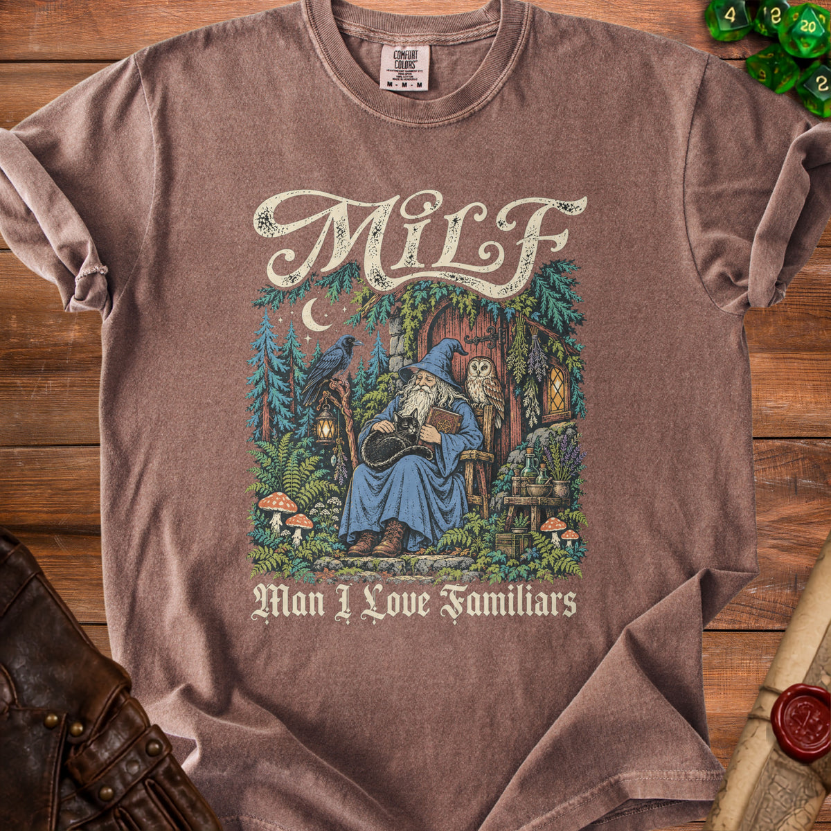 Brown t-shirt with "MILF Man I Love Familiars" graphic of a wizard with animals.