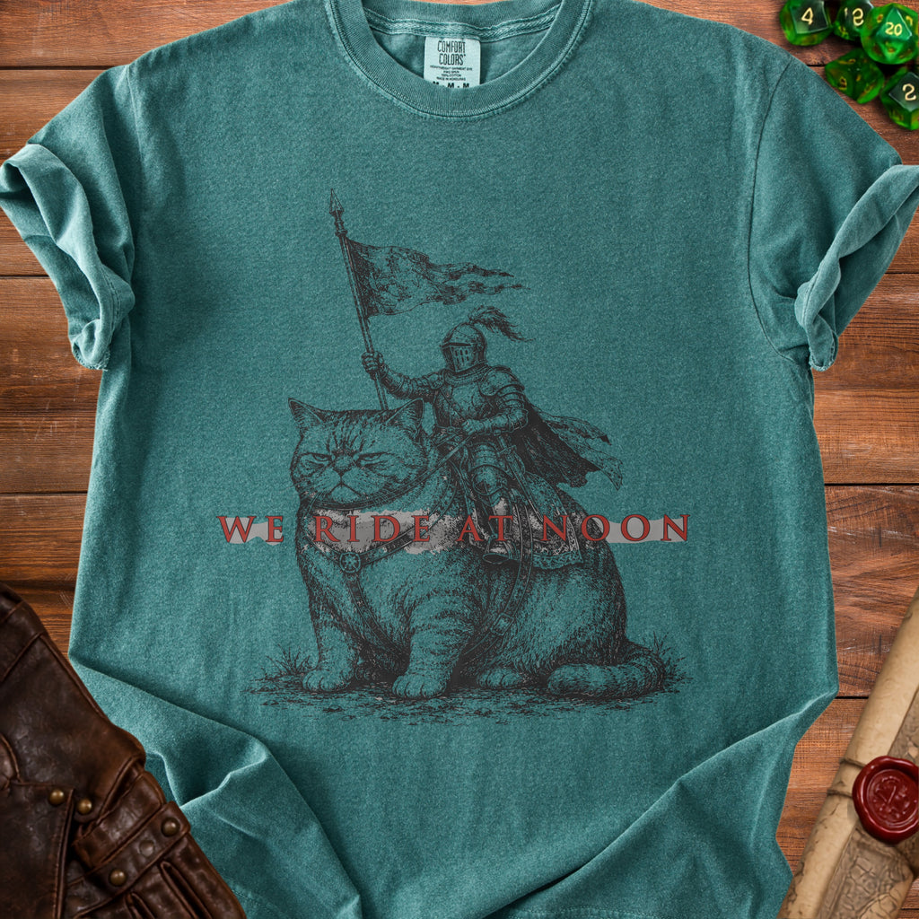 Knight on a cat holding a flag with text "We Ride At Noon".