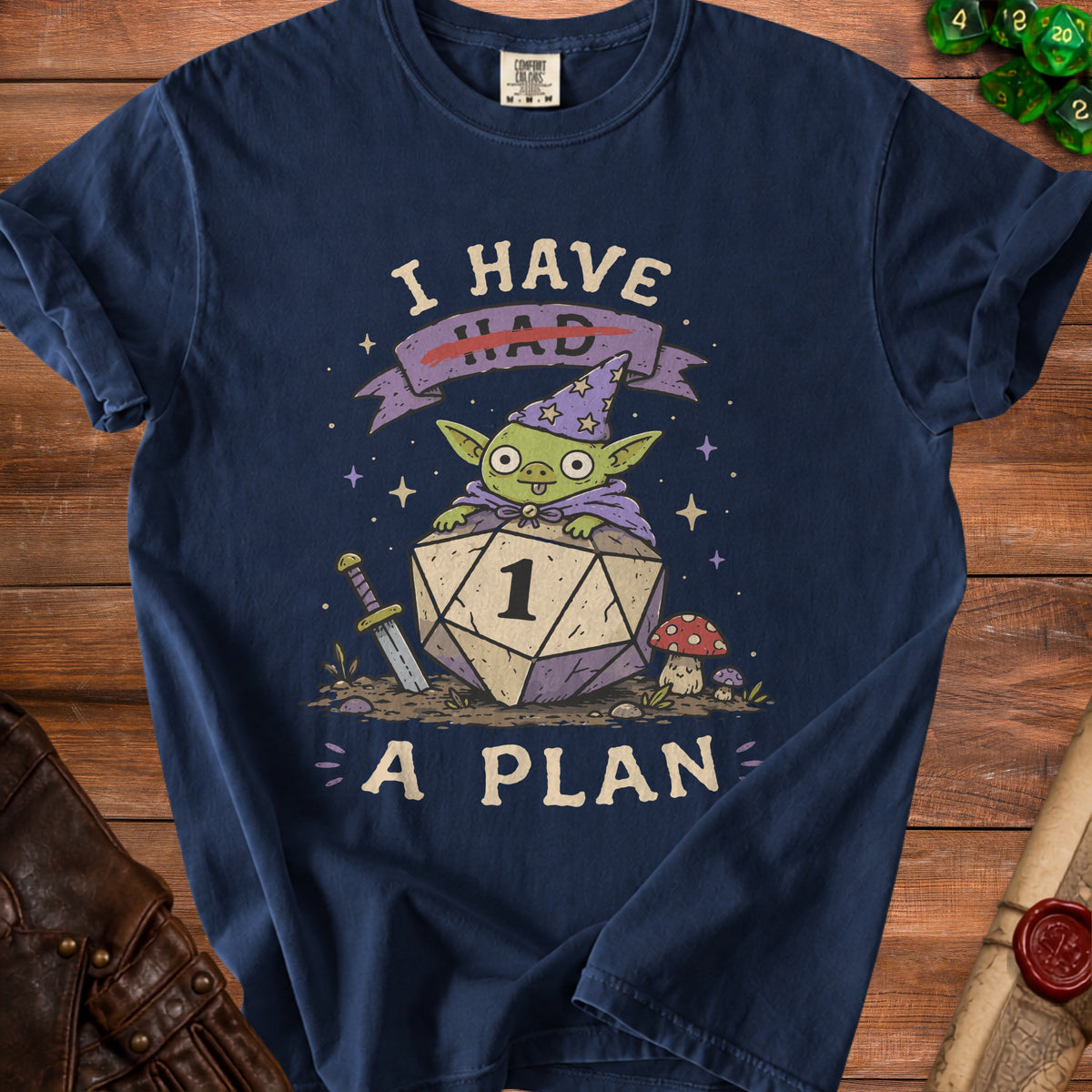 Navy t-shirt with a wizard goblin on a d20 die. Text says "I HAD A PLAN".