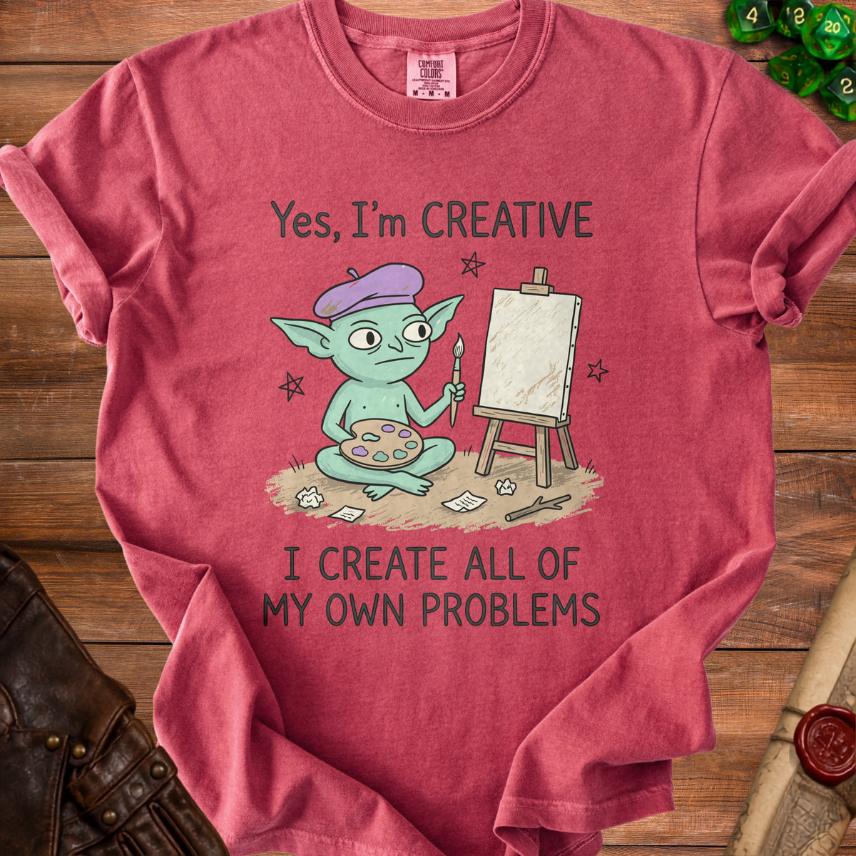 Green goblin wearing a beret paints on an easel, text says "Yes, I'm CREATIVE I CREATE ALL OF MY OWN PROBLEMS".