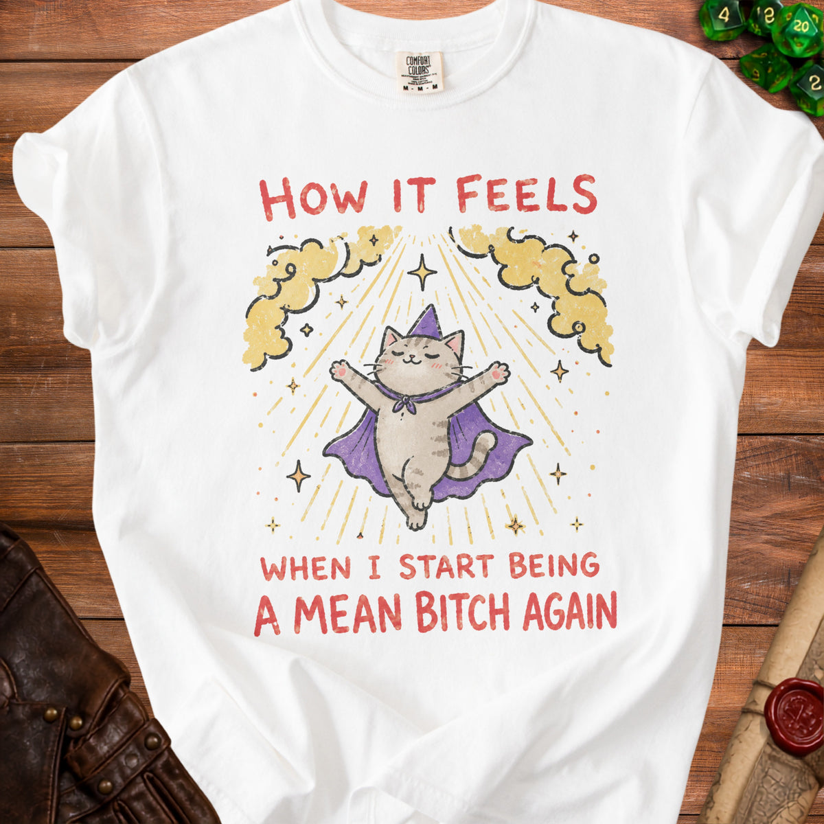 White t-shirt with a cat wearing a wizard hat and cape and text "How it feels when I start being a mean bitch again."