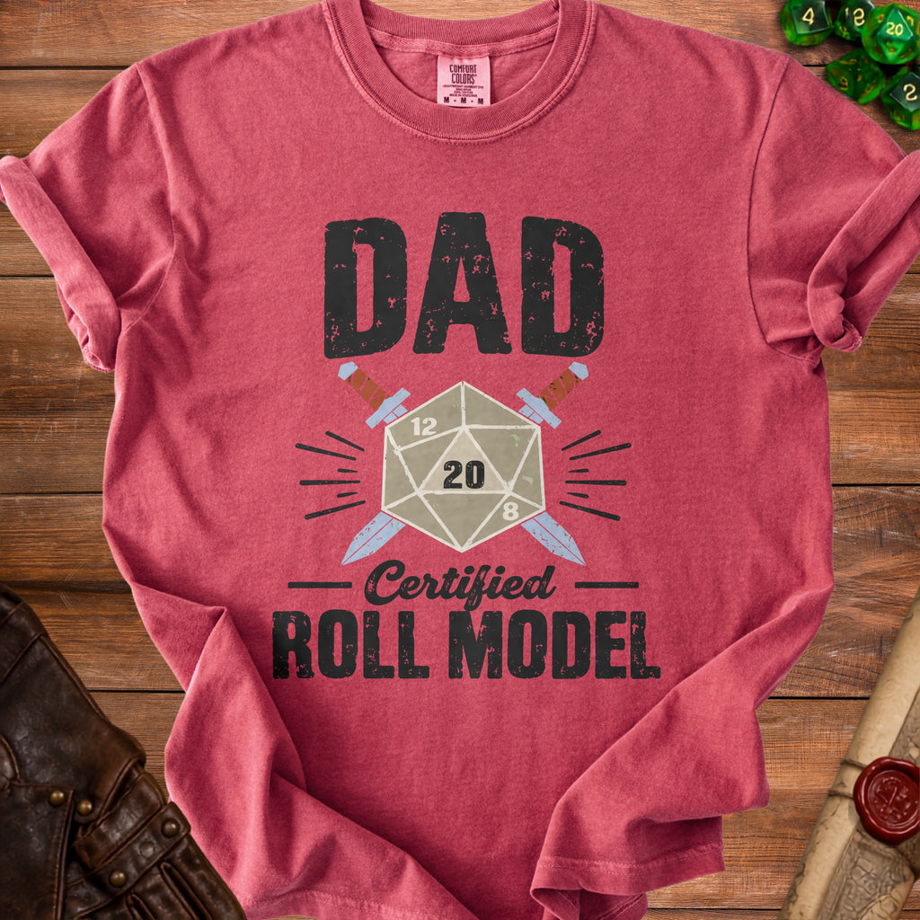 Red t-shirt with "DAD Certified ROLL MODEL" text and D20 dice.