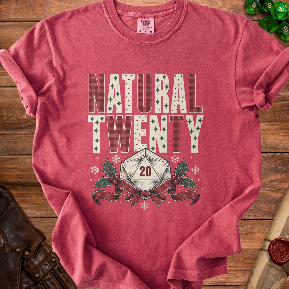 Red t-shirt with "NATURAL TWENTY" text and a D20 die with Christmas holly.