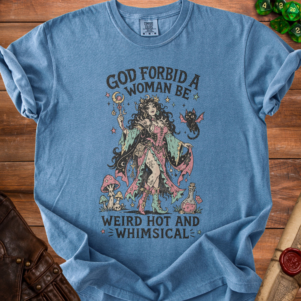 Blue t-shirt with "God forbid a woman be weird, hot, and whimsical" text and witch graphic.