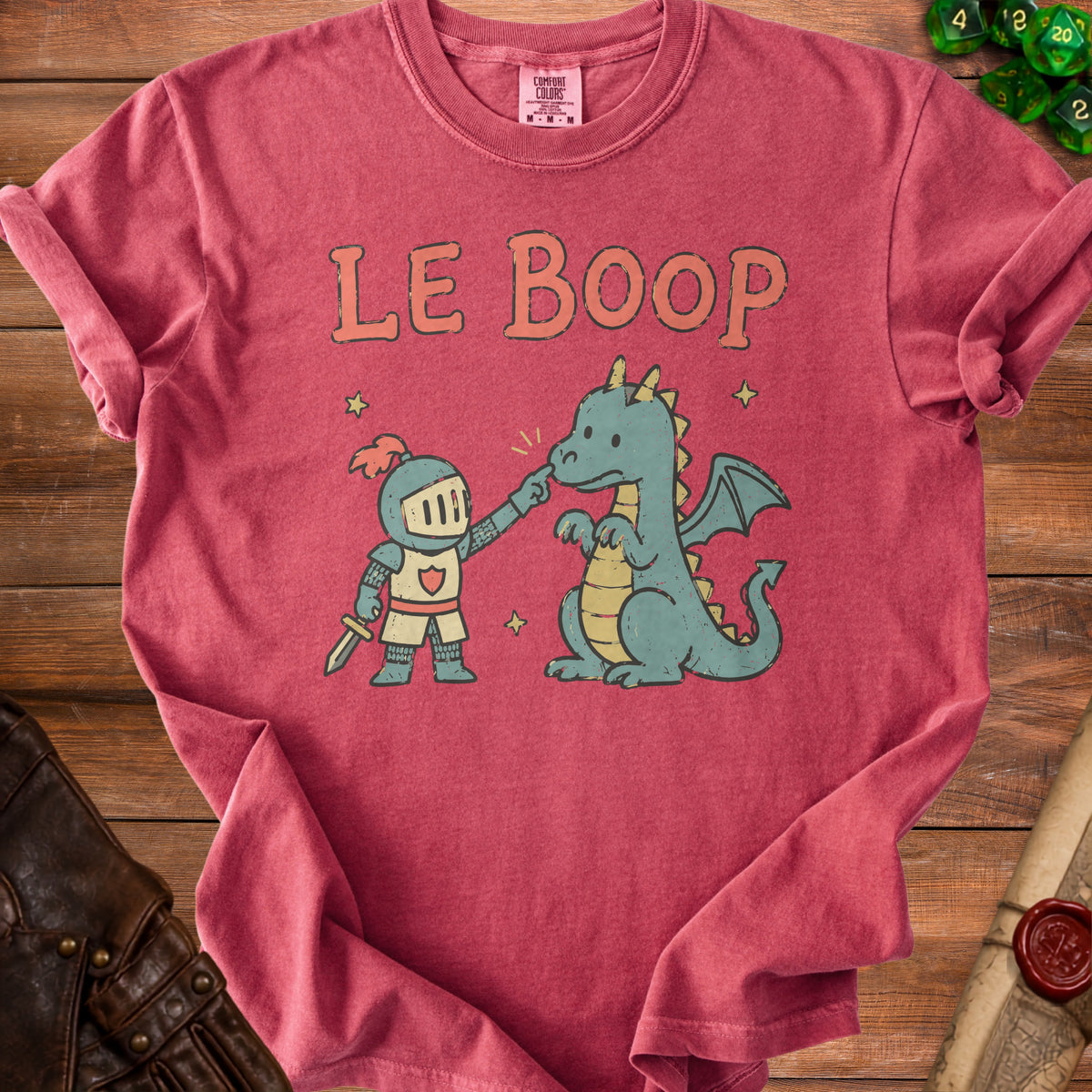 Red t-shirt with a knight poking a dragon's nose, text "LE BOOP".