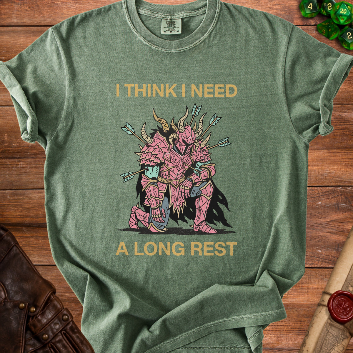 Green t-shirt with knight graphic and text "I THINK I NEED A LONG REST".