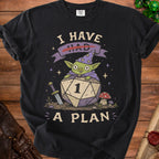 Black t-shirt graphic of a green goblin on a d20 die with text "I HAD A PLAN".
