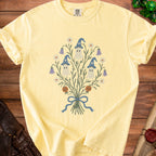 Yellow t-shirt with a bouquet of ghosts, pumpkins, and flowers design.