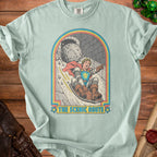 Shirt graphic: Knight on a sled chased by a boulder, text "The Scenic Route".