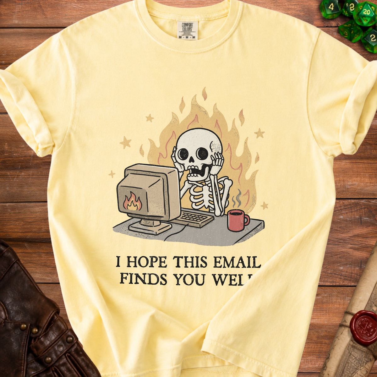 Skeleton at computer on fire, text "I HOPE THIS EMAIL FINDS YOU WEI".