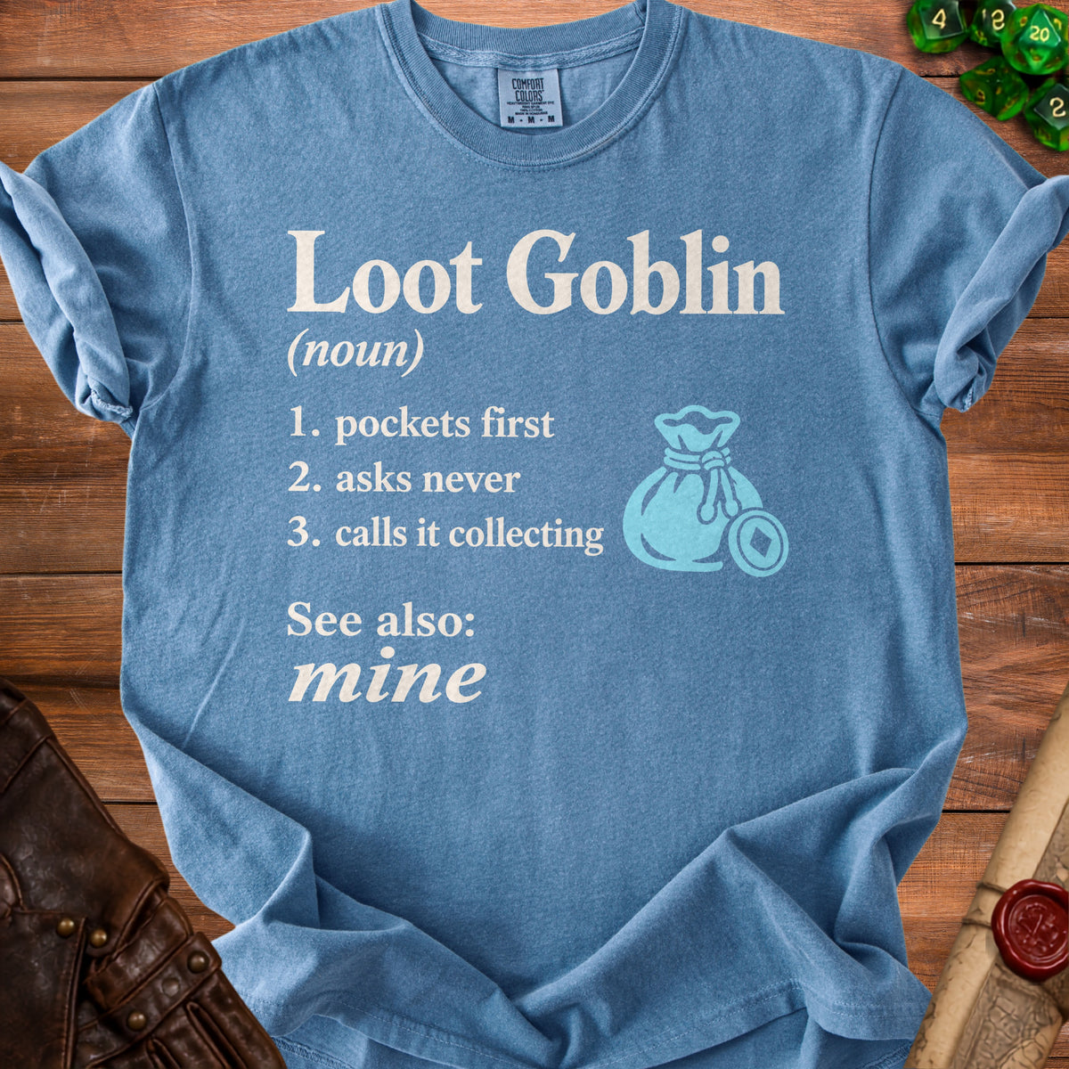 Blue t-shirt with "Loot Goblin" definition and a money bag graphic.