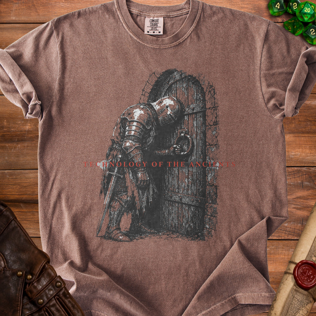 Brown t-shirt with graphic of knight at weathered door and text "TECHNOLOGY OF THE ANCIENTS".