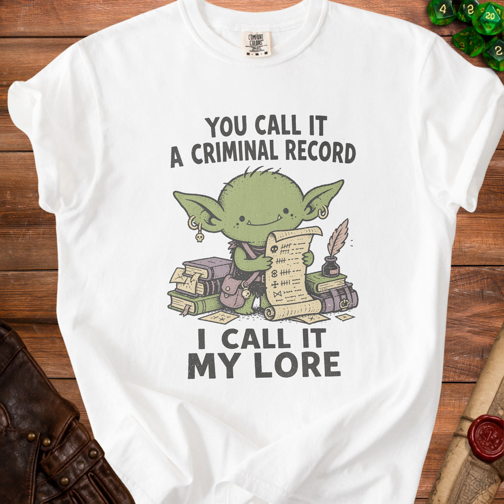 White t-shirt with a goblin holding a scroll, reading "You call it a criminal record. I call it my lore."