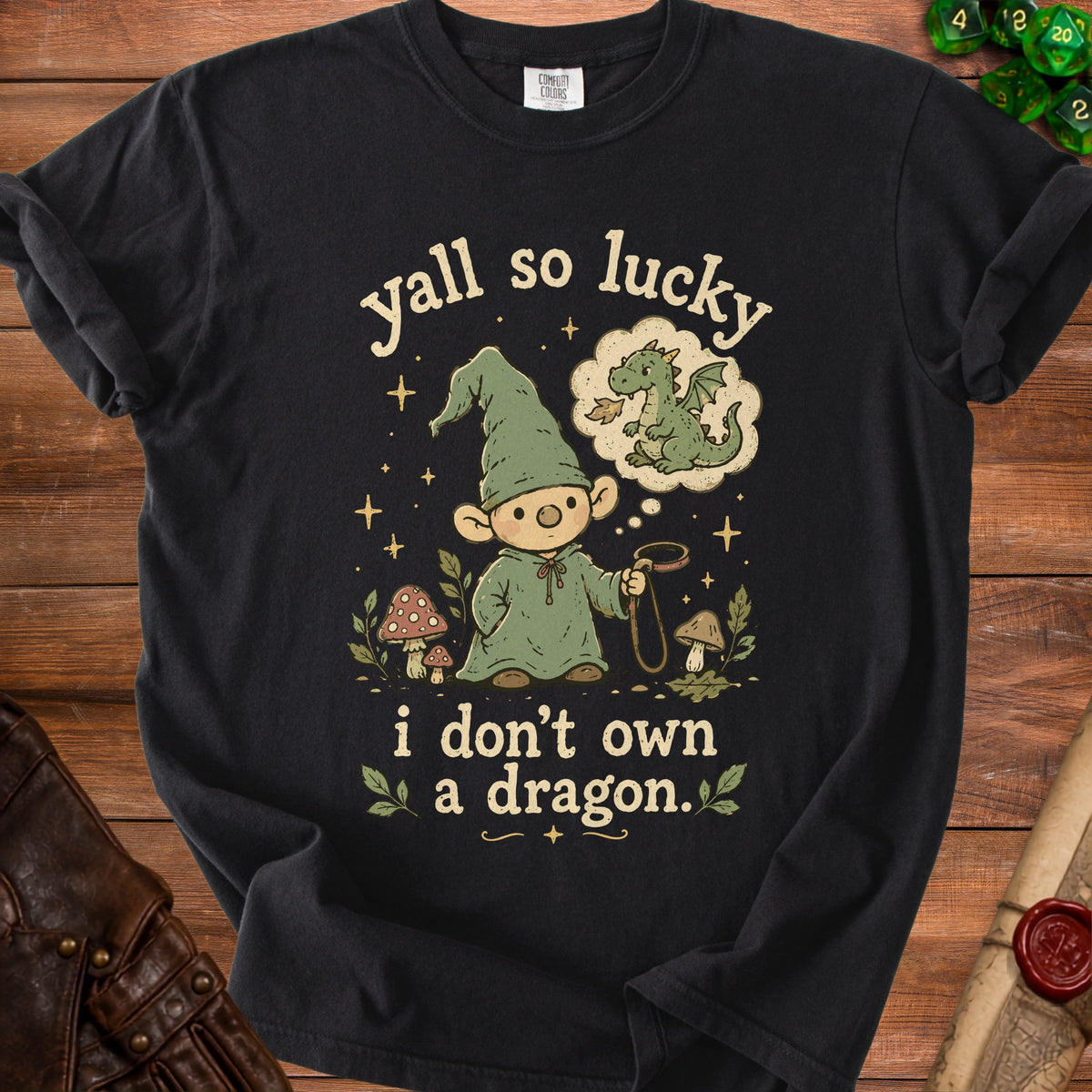 Black t-shirt with gnome graphic and text "yall so lucky i don't own a dragon."