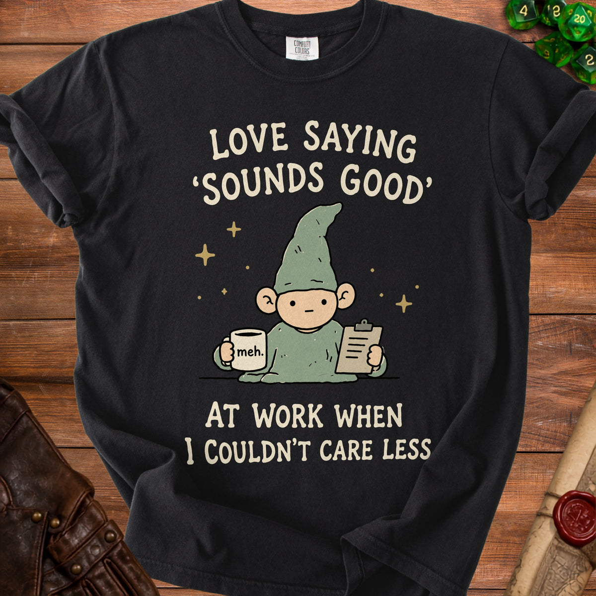 Black t-shirt with gnome graphic and text "LOVE SAYING 'SOUNDS GOOD' AT WORK WHEN I COULDN'T CARE LESS."