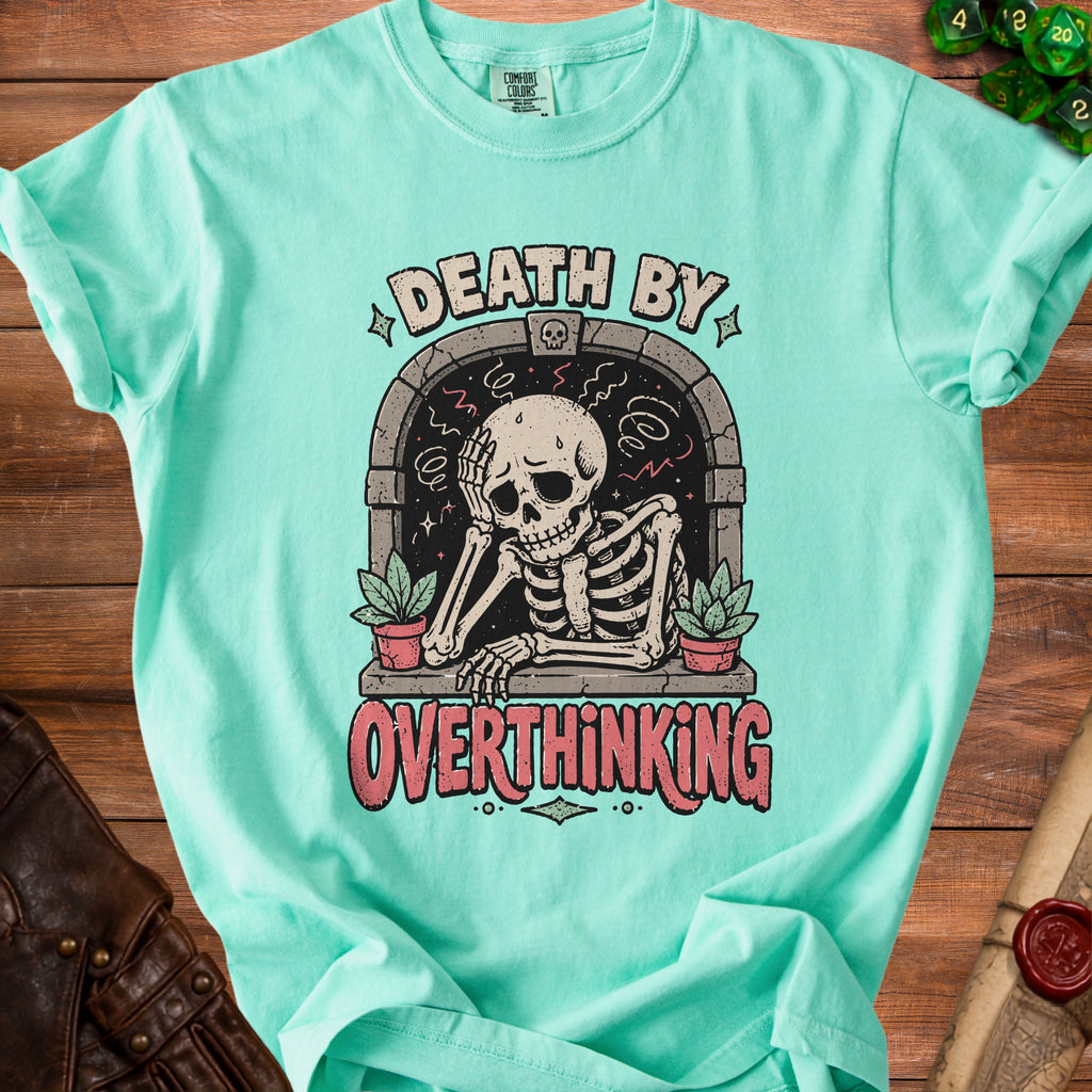Aqua t-shirt with a skeleton graphic and the text "DEATH BY OVERTHINKING".