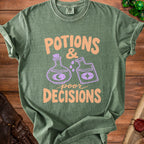 Green t-shirt with "Potions & poor Decisions" text and potion bottle graphics.