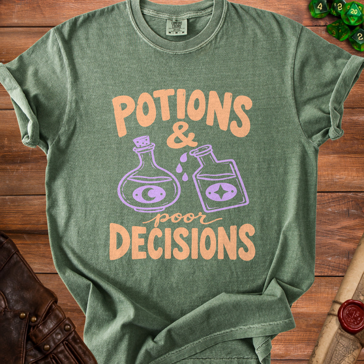 Green t-shirt with "Potions & poor Decisions" text and potion bottle graphics.