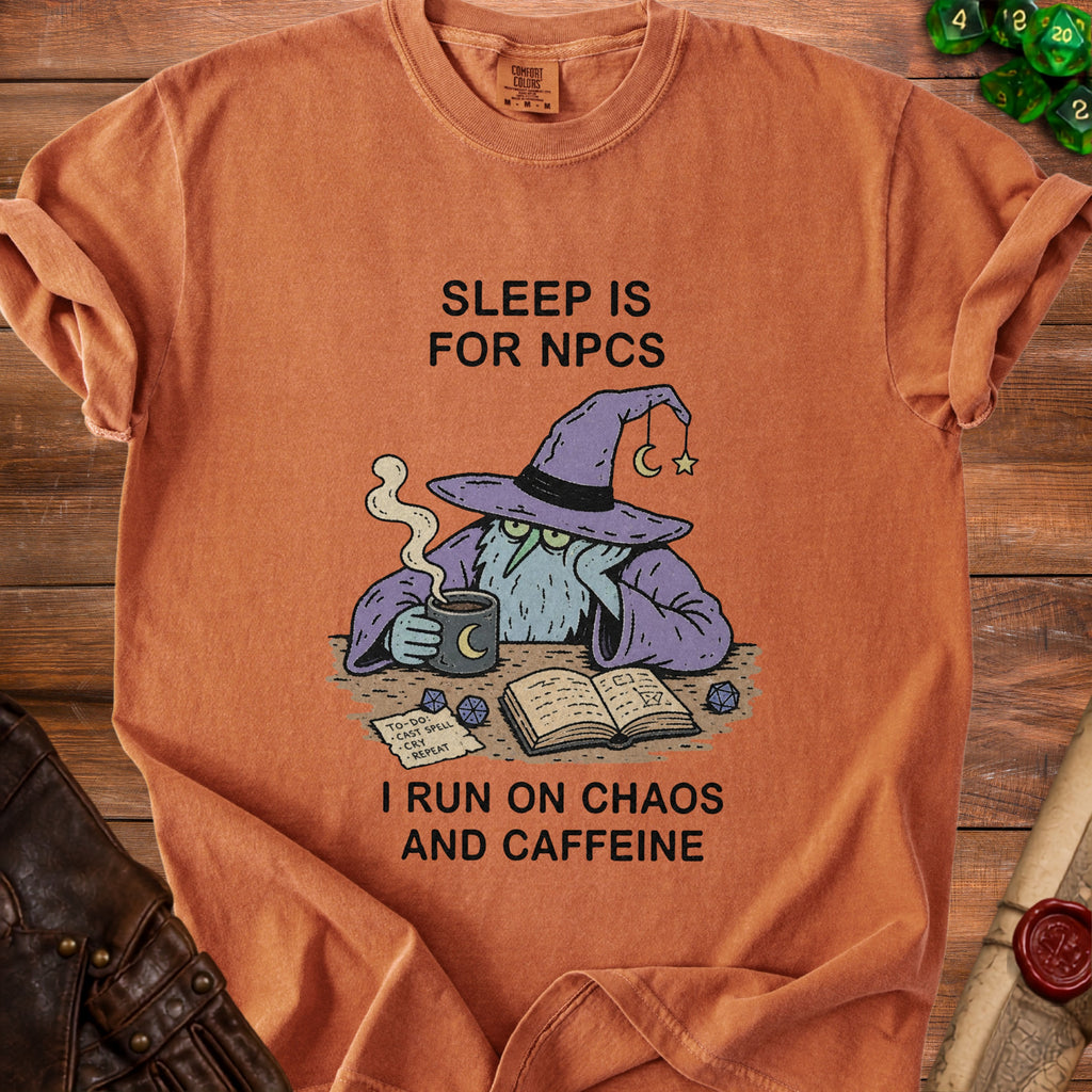 T-shirt with wizard graphic and text "Sleep is for NPCs. I run on chaos and caffeine."