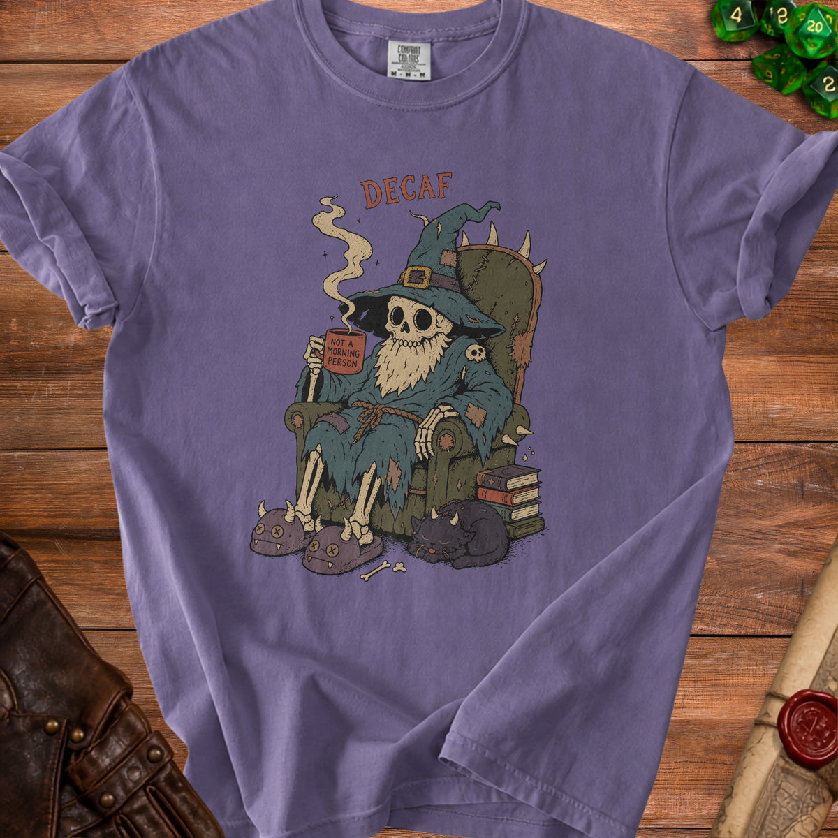 Skeleton wizard in robe holding "Not a Morning Person" mug, "DECAF" text.