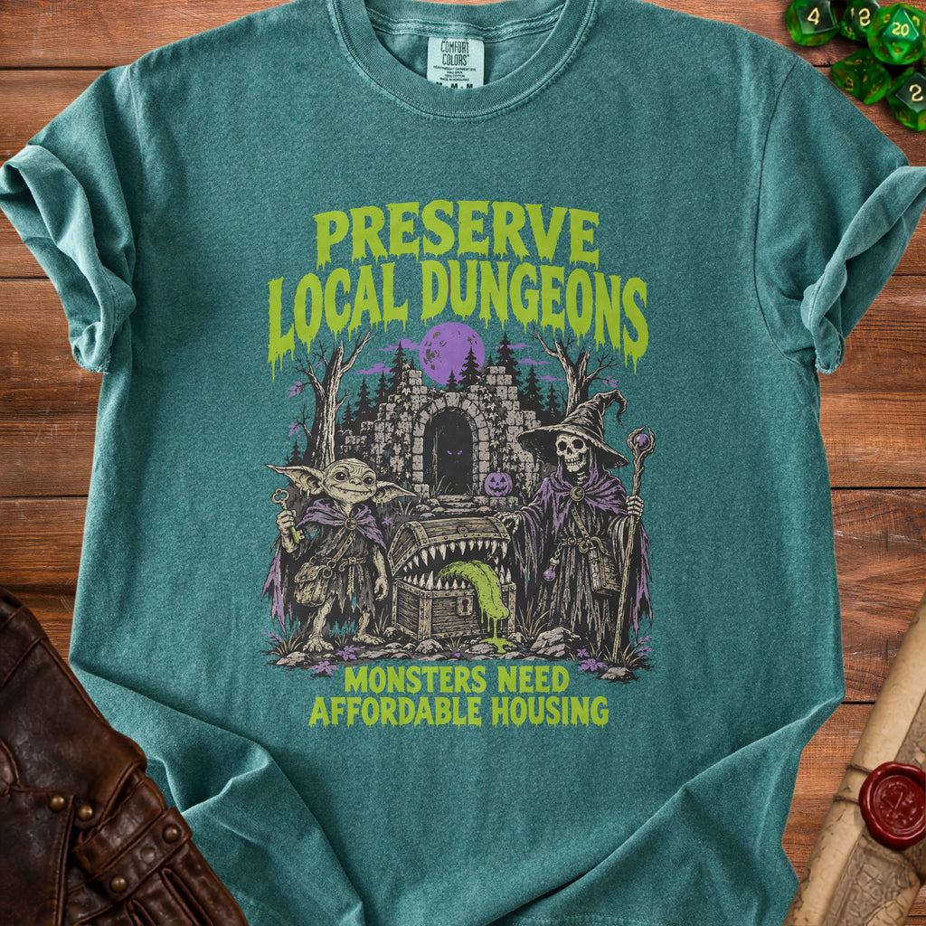 T-shirt with "Preserve Local Dungeons" and "Monsters Need Affordable Housing" text.