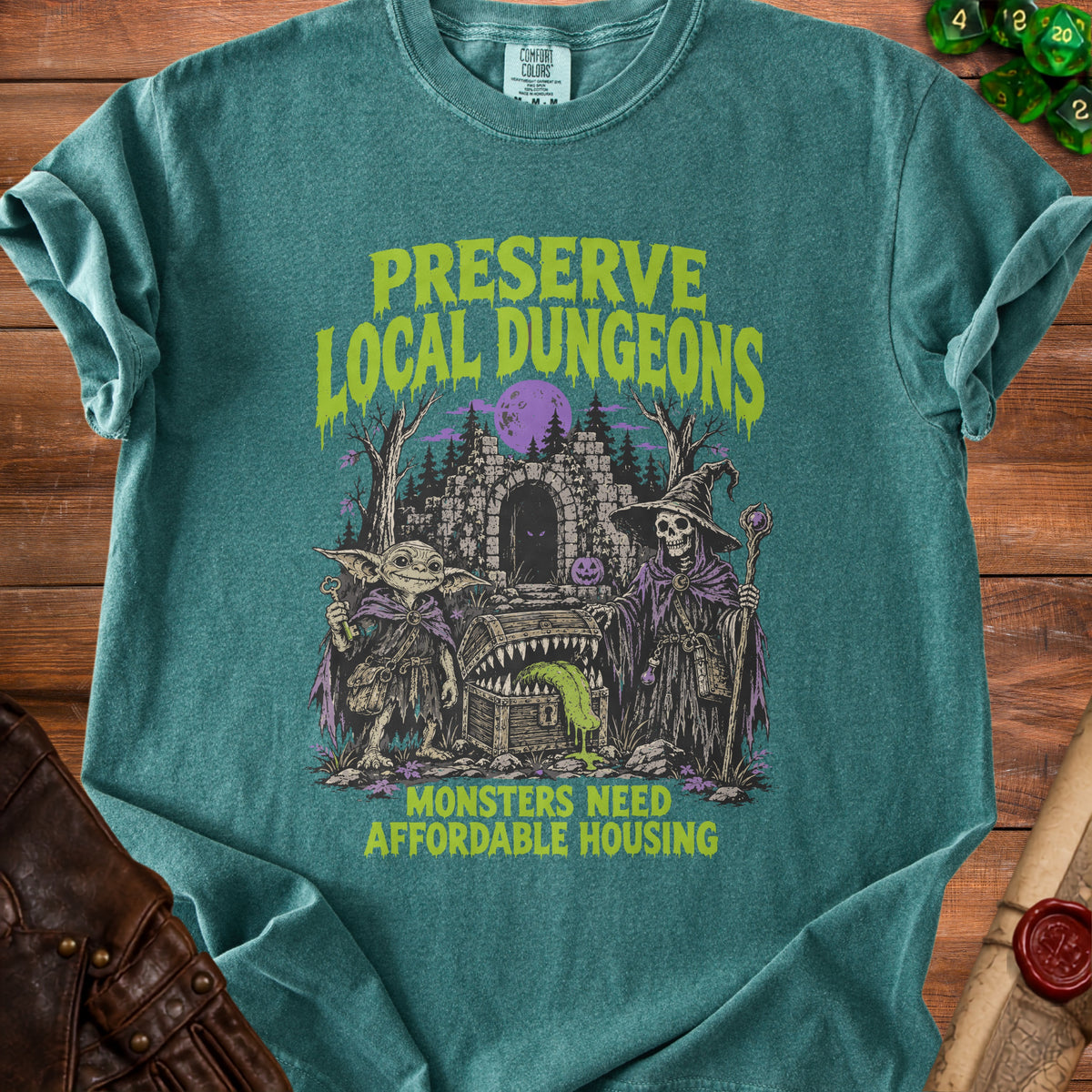 T-shirt with "Preserve Local Dungeons" and "Monsters Need Affordable Housing" text.
