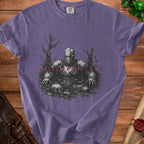 Purple t-shirt with knight in swamp graphic and text "GOING THROUGH IT."